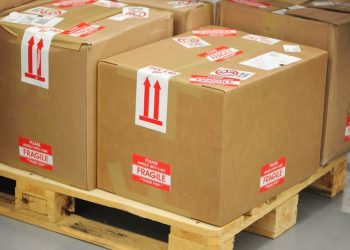 A pallet with stacked boxes, representing the importance of precise shipping quotes for e-commerce businesses.