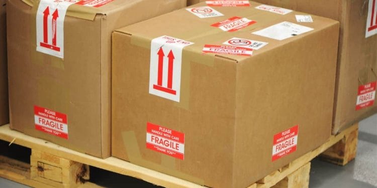 A pallet with stacked boxes, representing the importance of precise shipping quotes for e-commerce businesses.