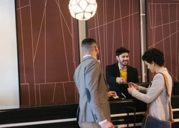 a business couple at the reception of a business hotel