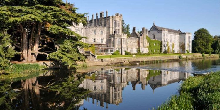 A striking medieval castle hotel nestled amidst verdant countryside, offering guests a regal retreat and a timeless journey into the U.K.'s storied past.