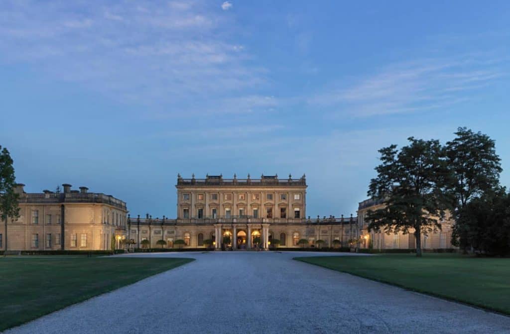 The magnificent Cliveden House, with its stately architecture and manicured gardens, beckoning guests to explore its storied halls and savour the opulence of a bygone era.