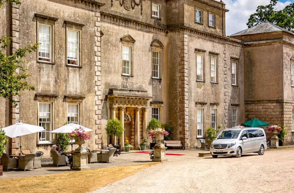 The elegant Ston Easton Park manor, with its impressive architecture and sprawling grounds, inviting guests to indulge in the grandeur and beauty of the U.K.'s storied past.