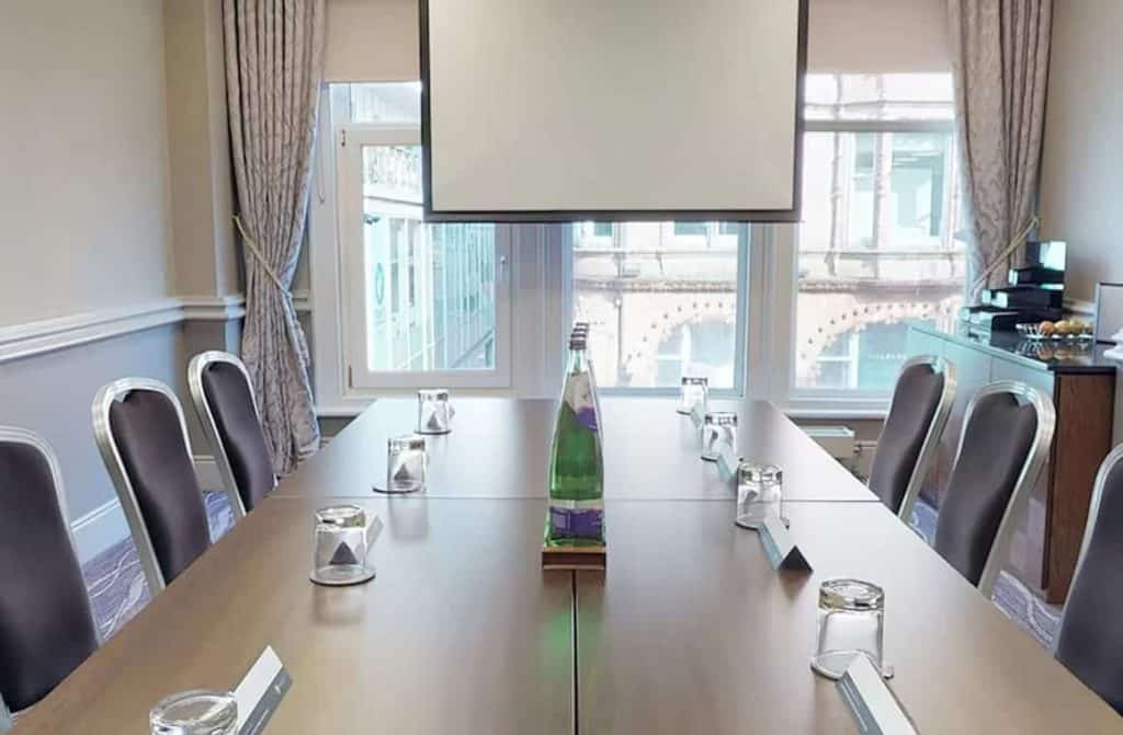 A boardroom suite in The Macdonald Burlington Hotel being featured in the blog article, "10 Best Business Hotels with Conference Facilities in Birmingham
