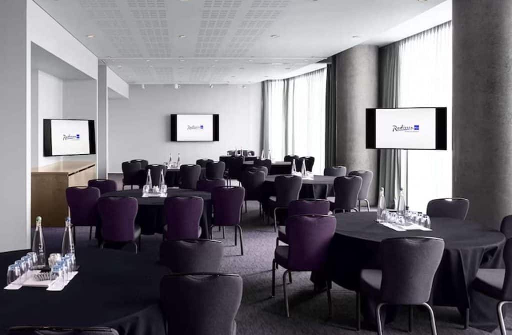 one of the boardroom suites in the Radisson Blu Hotel Birmingham being featured in the blog article, "10 Best Business Hotels with Conference Facilities in Birmingham"