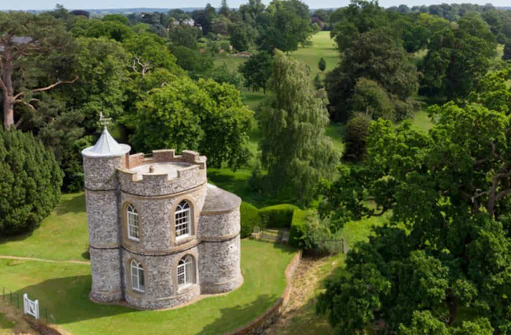 The captivating Prospect Tower, nestled amidst lush greenery, offering guests a historic and picturesque retreat within the U.K.'s stunning landscape.