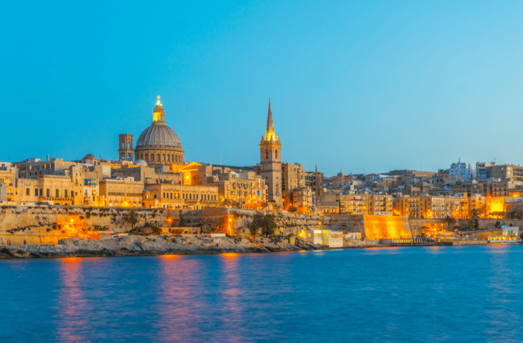 Picturesque view of Malta's historic architecture and Mediterranean coastline.