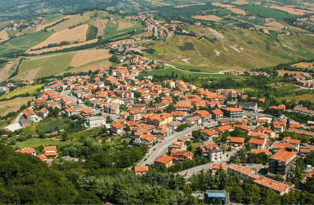 Aerial view of San Marino showcasing its historic architecture and mountainous terrain.